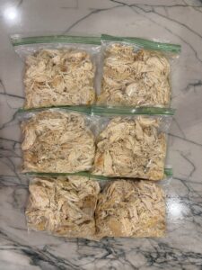 Bulk cooked, shredded chicken all ready to head to the freezer and use for family dinner later.